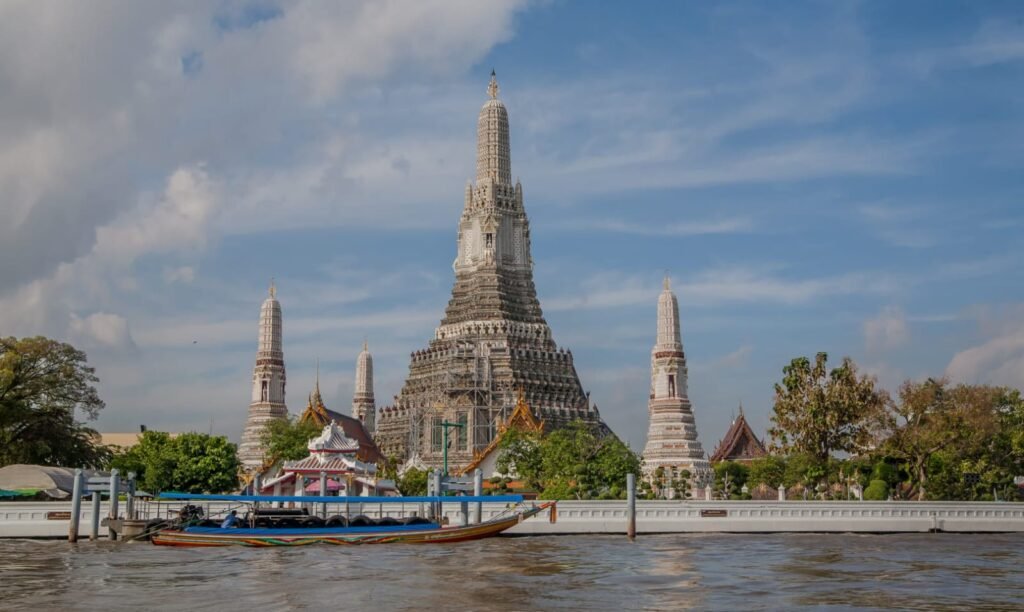 Wat Arun temple view from Chao Phraya river Bangkok Thailand